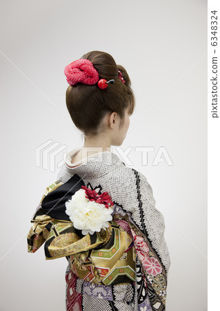 A pretty woman in kimonos looking good in Japanese hair 6348324