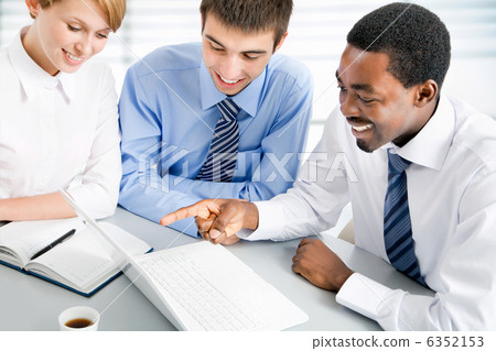 Businesspeople working at meeting Businesspeople working at meeting 6352153