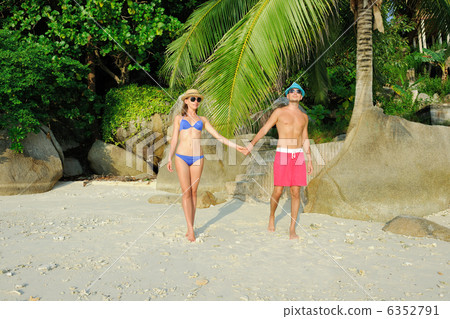 Couple on a beach 6352791