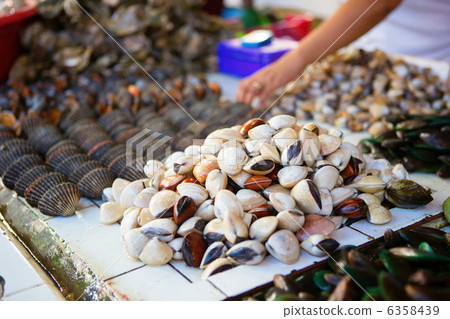 Sea clams on traditional seafood market on Boracay island in Phi 6358439