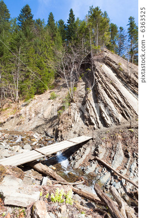 Planked footway across mountain brook Planked footway across mountain brook 6363525