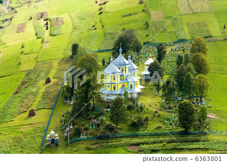 Small mountain village church 6363801