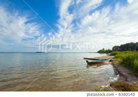 Boat near the summer lake shore 6380140