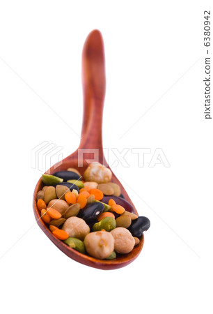 collection of beans, legumes, peas, lentils on wooden spoons 6380942