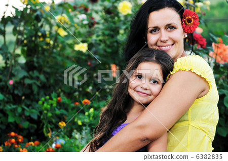happy mom and daughter outdoor happy mom and daughter outdoor 6382835
