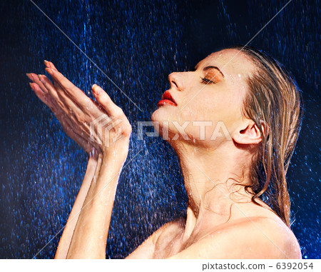 Wet woman face with water drop. 6392054