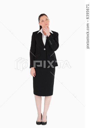 Charming female in suit posing Charming female in suit posing 6395671