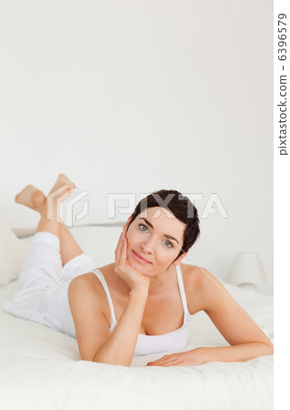Portrait of a charming woman posing 6396579
