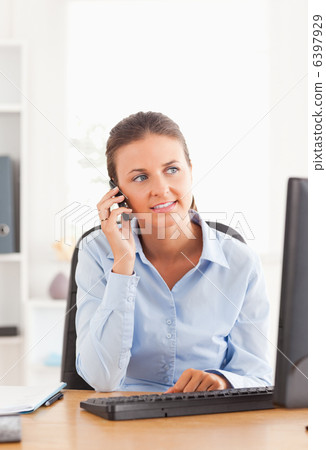 Businesswoman making a phone call 6397929