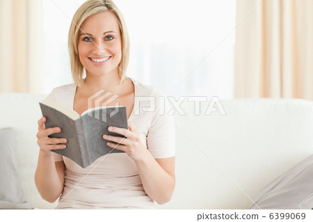 Fair-haired woman with a book Fair-haired woman with a book 6399069