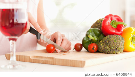 Woman with a glass of wine Woman with a glass of wine 6400944
