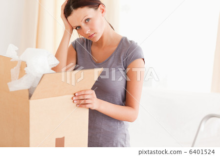 Woman with cardboard 6401524