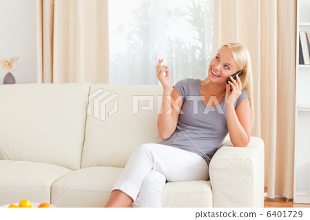 Smiling woman on the phone 6401729