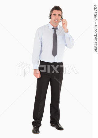 Operator using a headset 6402704