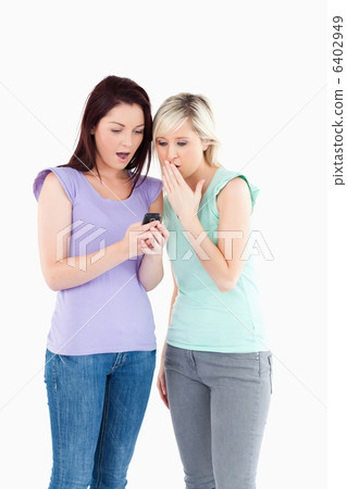 Shocked Women with a phone 6402949