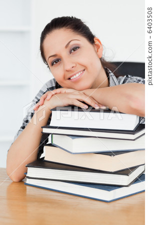 Cheerful young student looking to camera 6403508