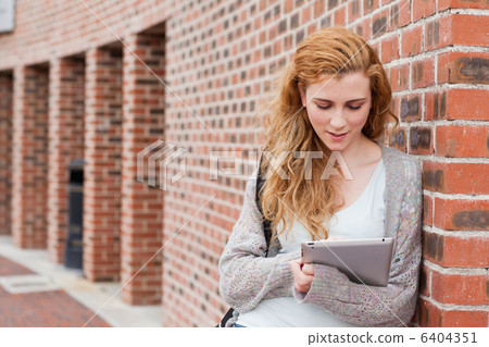Young student using a tablet computer 6404351