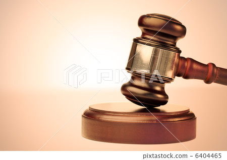 Close up of a brown gavel Close up of a brown gavel 6404465