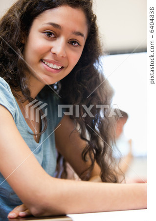 Portrait of a smiling young student 6404838