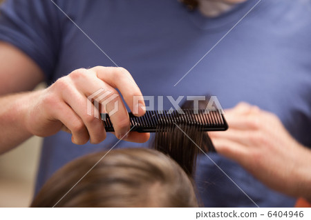 Hand combing hair 6404946