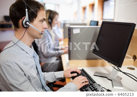 Serious operator using a computer 6405213