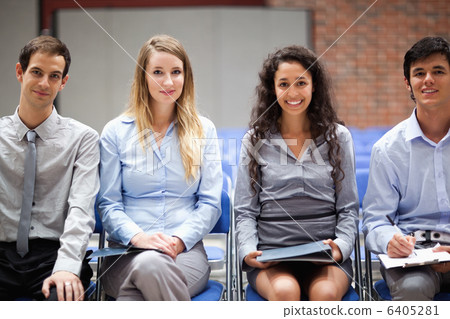 Business people sitting on chairs Business people sitting on chairs 6405281