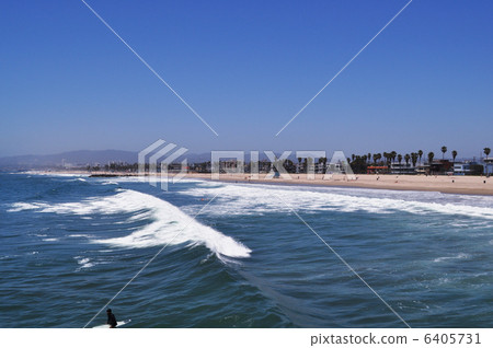 Blue sky seen from Venice beach pier in California, USA, wave and sand beach Blue sky seen from Venice beach pier in California, USA, wave and sand beach 6405731