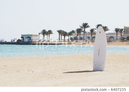 single windsurfing board in a sand of a beach 6407235