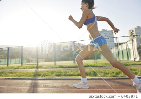 woman jogging at early morning woman jogging at early morning 6408971