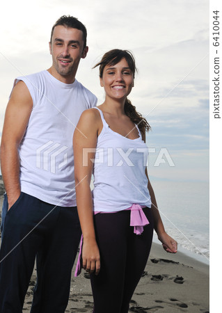 happy young couple have fun at beautiful beach happy young couple have fun at beautiful beach 6410044