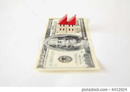 $ 100 bill and toy house 6412024