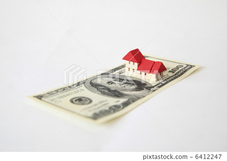 $ 100 bill and toy house $ 100 bill and toy house 6412247