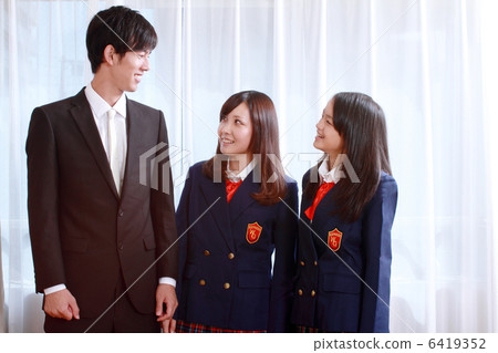 Teacher and two girls high school students Teacher and two girls high school students 6419352