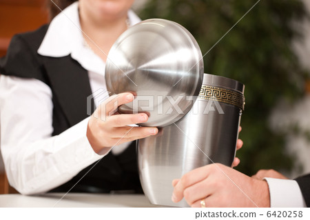 mortician with client comforting and advising 6420258