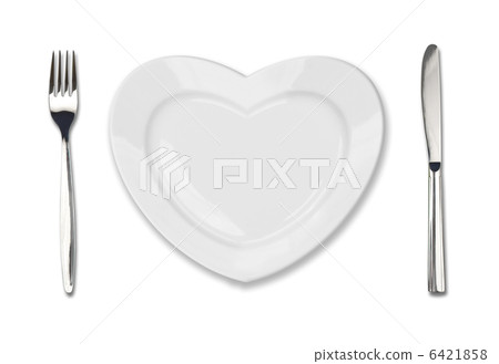 plate in shape of heart, table knife and fork isolated on white 6421858