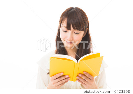 A woman reading a book 6423398