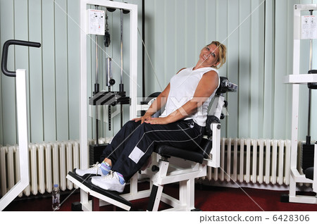 Mature  woman work out in fitness 6428306