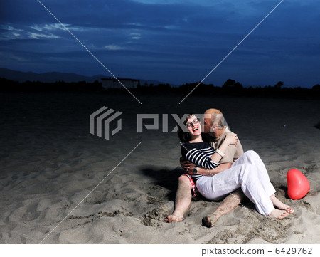 happy young couple have fun on beach 6429762