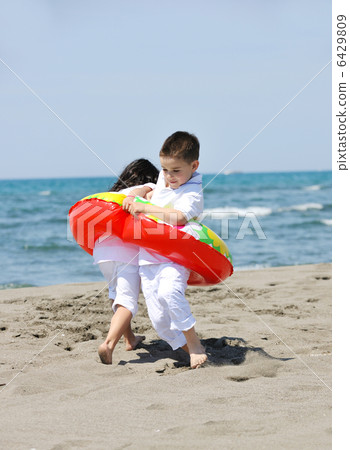 happy young people group have fun on beach 6429809