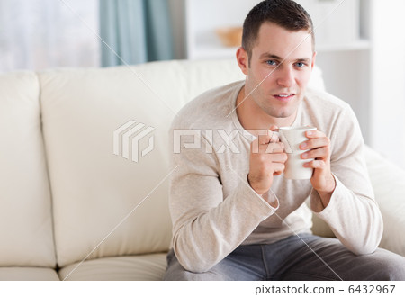 Good looking man having a coffee 6432967