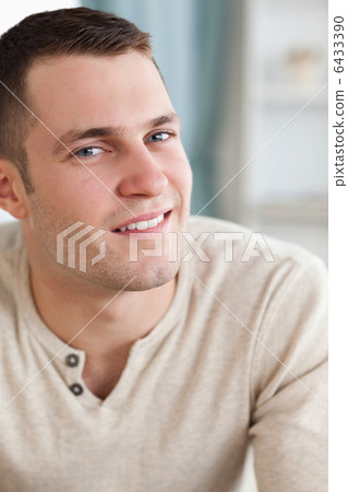 Portrait of a young man posing 6433390
