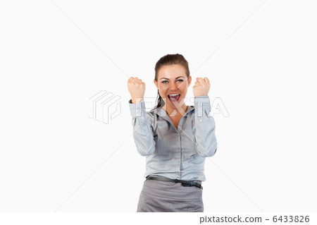 Happy businesswoman with the fists up Happy businesswoman with the fists up 6433826