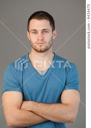Male with arms folded 6434470