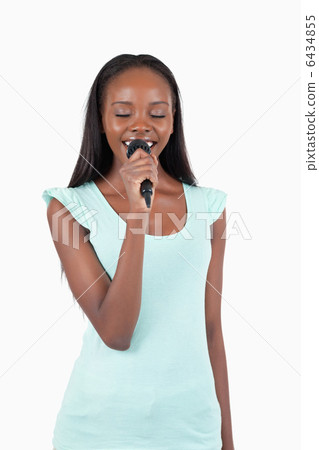 Cheerful smiling female singer 6434855