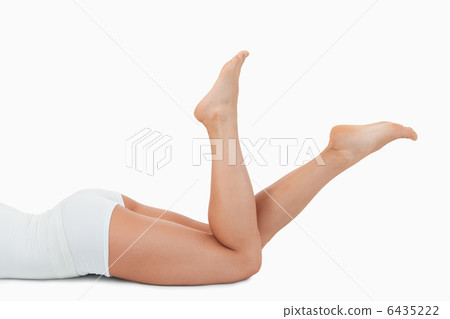 Feminine body lying on her belly Feminine body lying on her belly 6435222