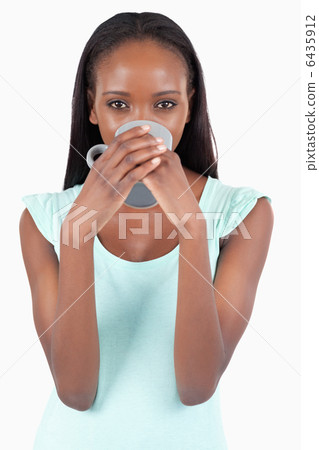 Young woman drinking coffee 6435912