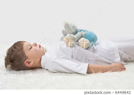 Childrens yoga. Yoga before a sleeping. The kid with a favourit Childrens yoga. Yoga before a sleeping. The kid with a favourit 6449642