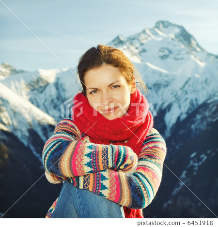 Attractive girl with mountains in background 6451918