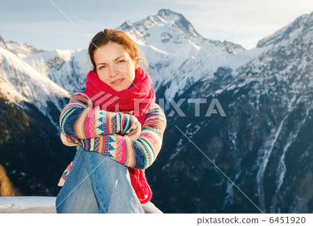 Attractive girl in winter Alps 6451920