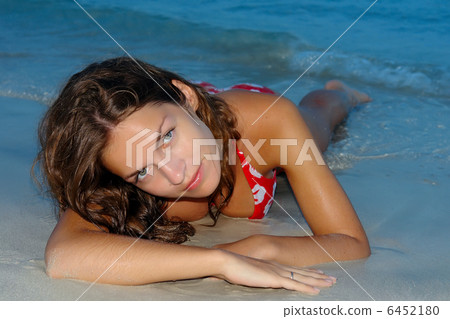 Young woman on the beach Young woman on the beach 6452180